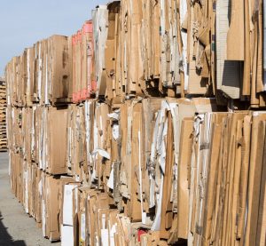 Corrugated cardboard bundled and ready for recycling.